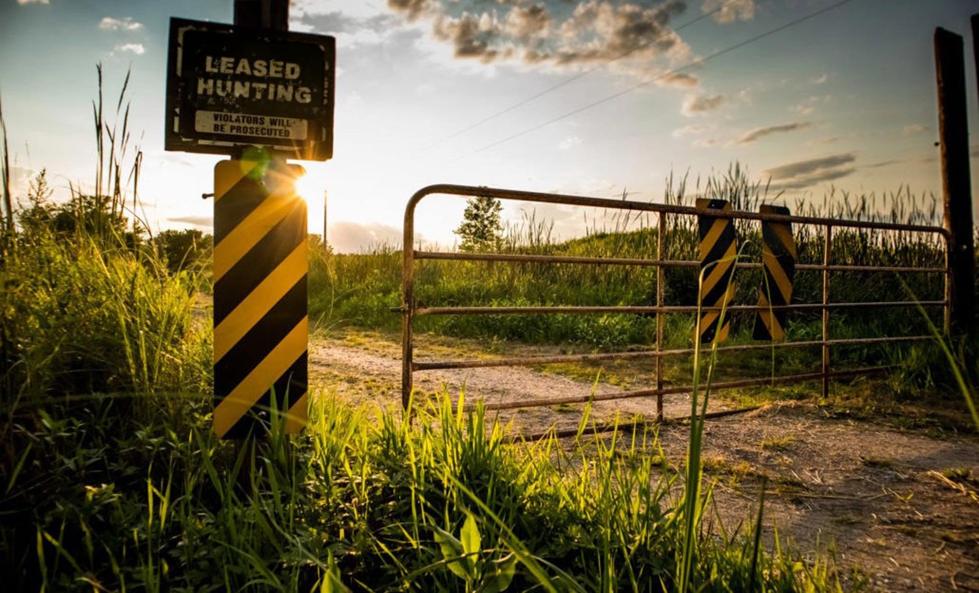 leased hunting sign on gated farmland in Nebraska - copyright-andrewbrown